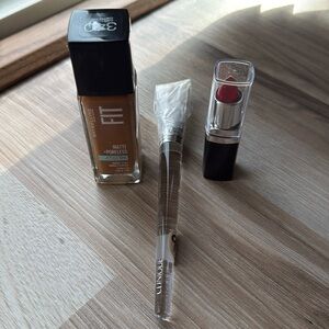 Bundle of three items ( make up, Lipstick, and makeup brush )
